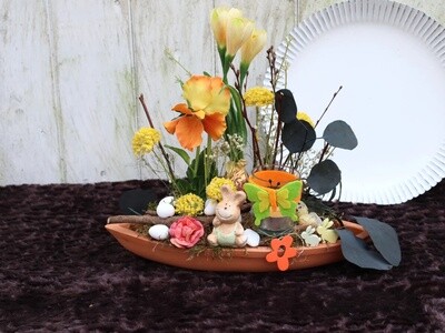 Tisch Gesteck Ostern Frühling gelb orange Hase