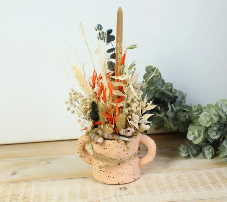 Gesteck Tischgesteck mit Trockenblumen orange apricot