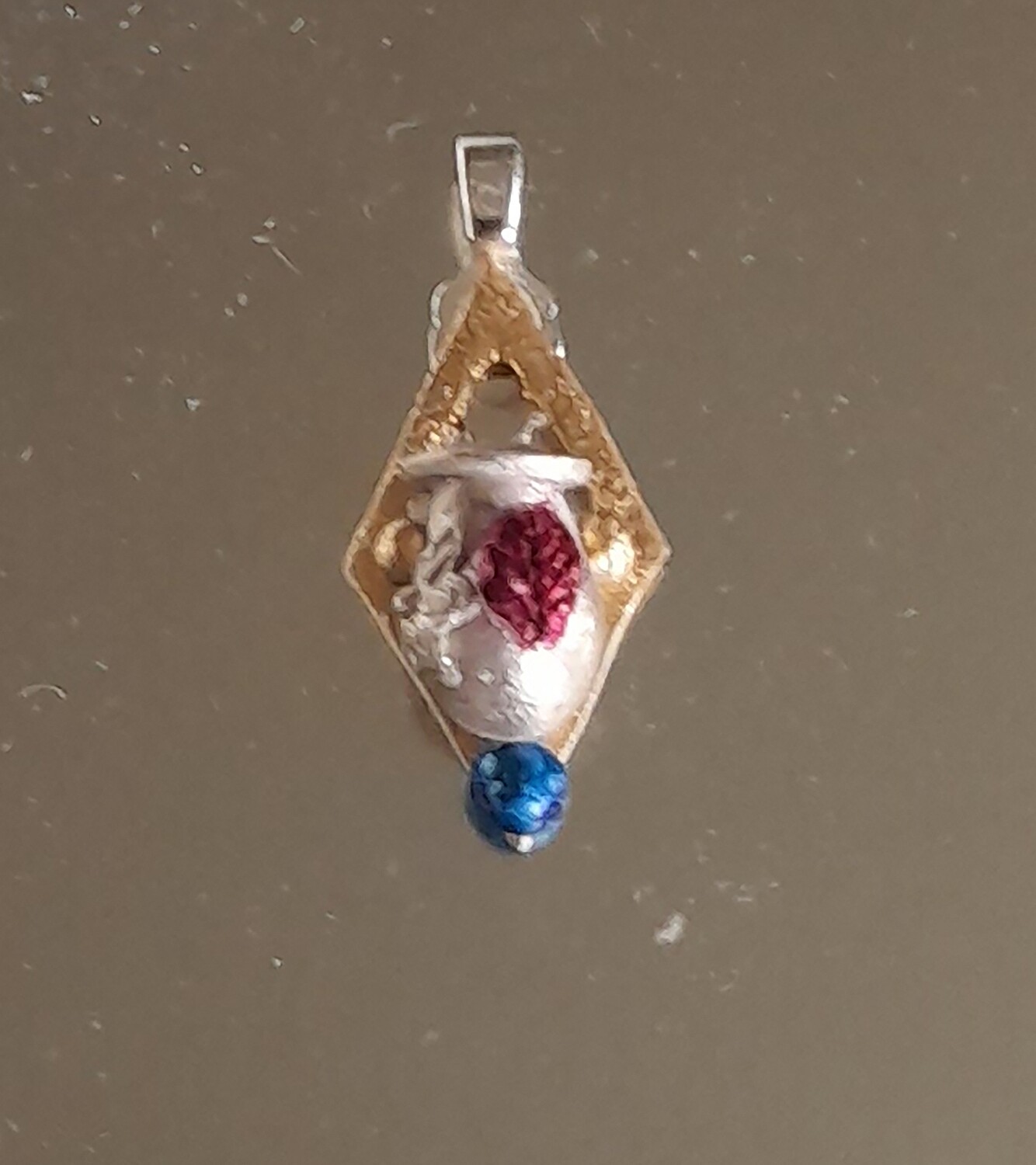 Silver handmade &#39;Essential Oils Scent Jar&#39; pendant with flower and leaf design (0.99% pure silver)&#39;
