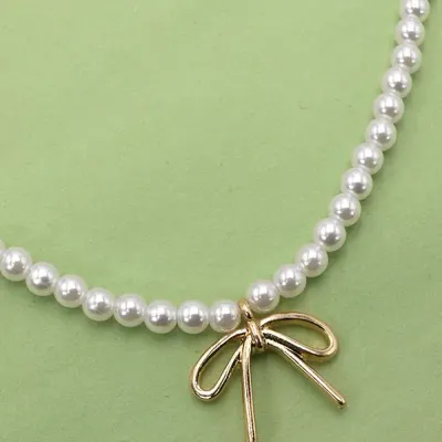 JOSSLYN Pearl Chain Bow Necklace 