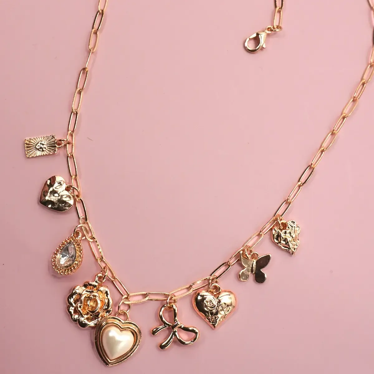 JOSSLYN Bow Heart Charm Necklace