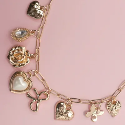 JOSSLYN Bow Heart Charm Necklace