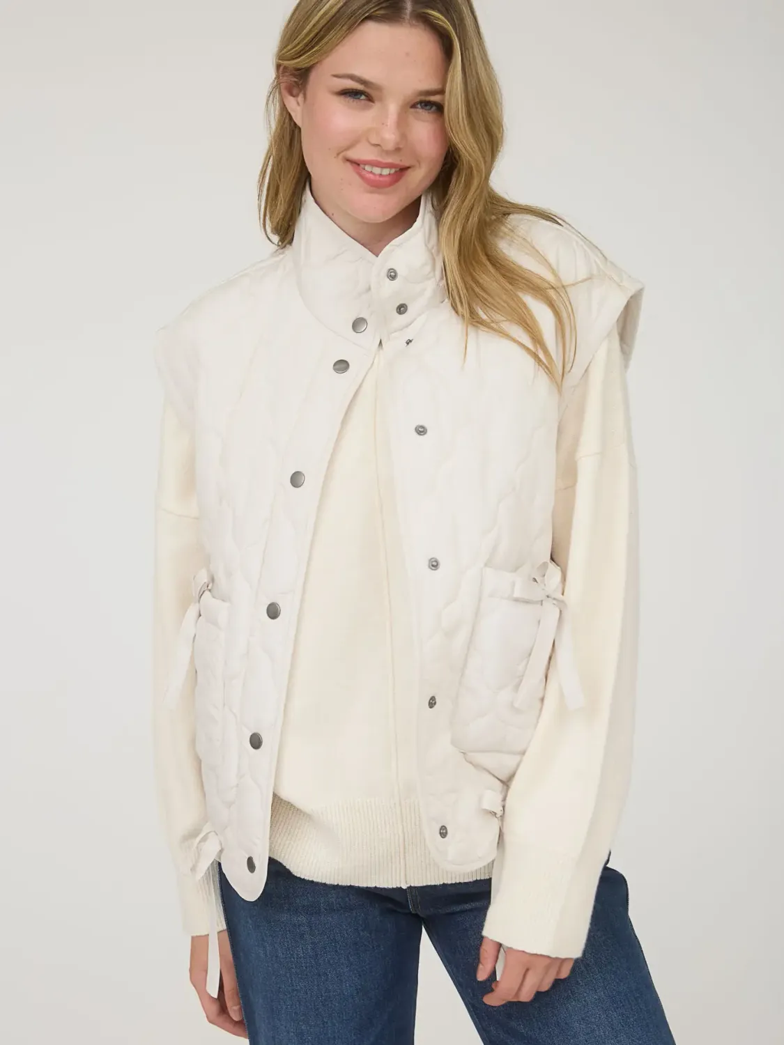 Ivory Bow Quilted Vest