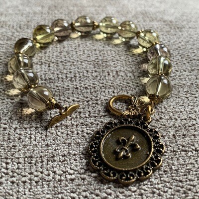 With Charm and Clasp
