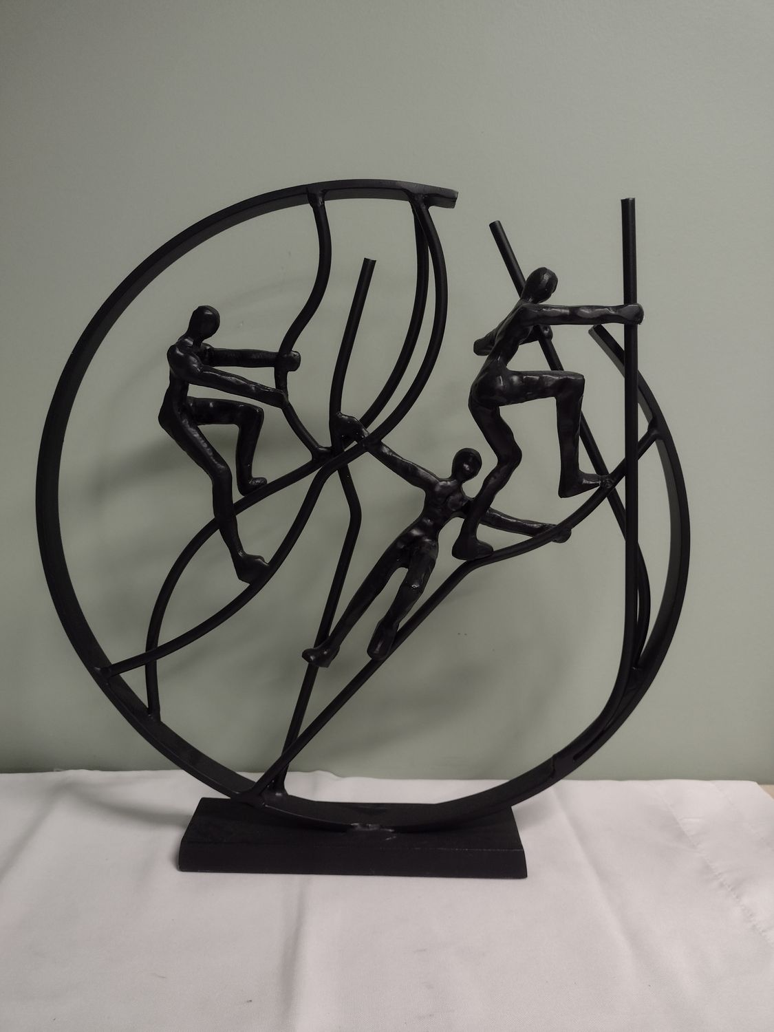 Cast Metal Climbing Statue