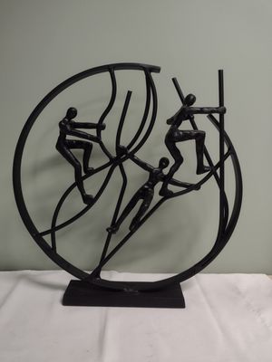 Cast Metal Climbing Statue