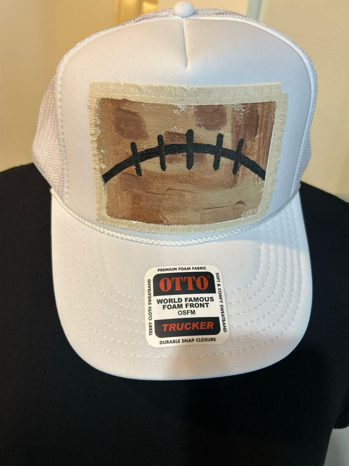 R.Anne Brim Trucker, Football