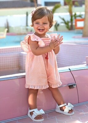 Mayoral swiss dot romper in salmon-smocked bodice