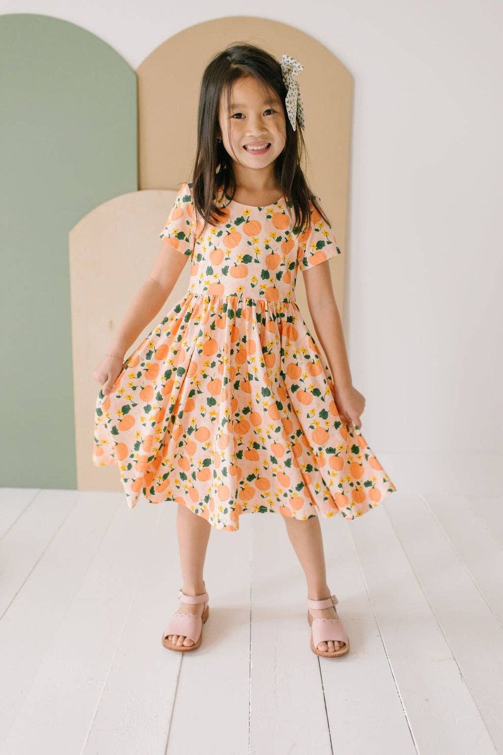 Ollie Jay classic twirl dress in pumpkins