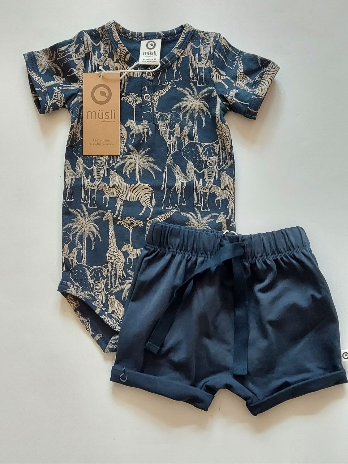 Danish Musli organic cotton safari bodysuit and navy knit shorts set