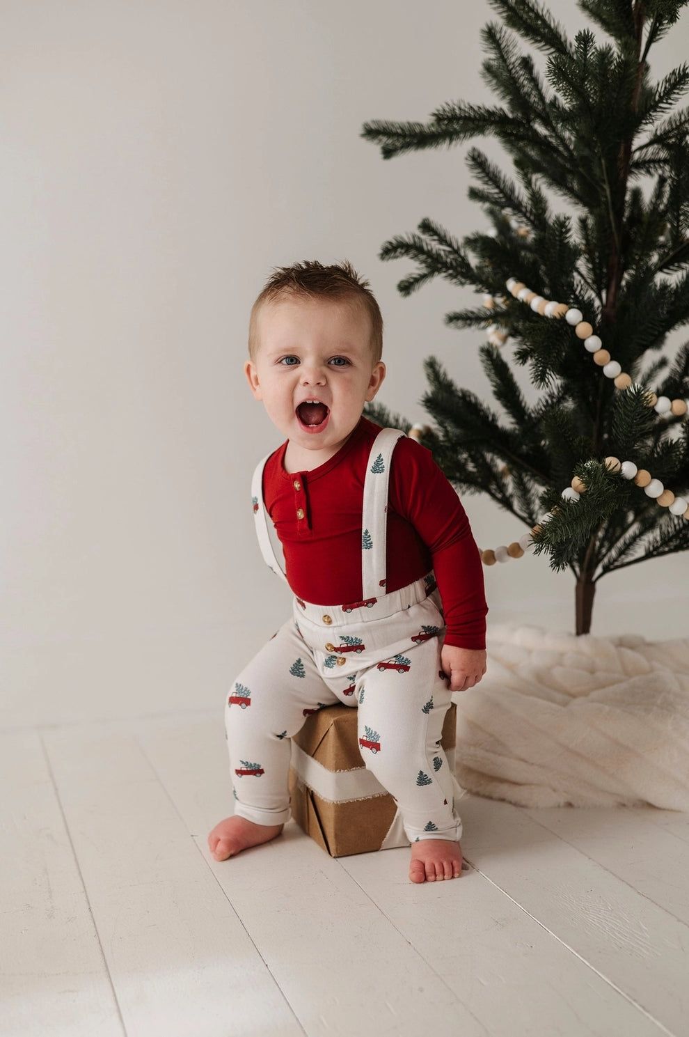 Holiday Baby Sprouts bamboo henley bodysuit and suspenders set