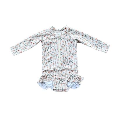 Baby Sprouts Daisy Fields one piece ruffle rash guard swimsuit