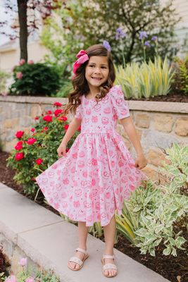 Ollie Jay Puff dress in Eat your heart out print