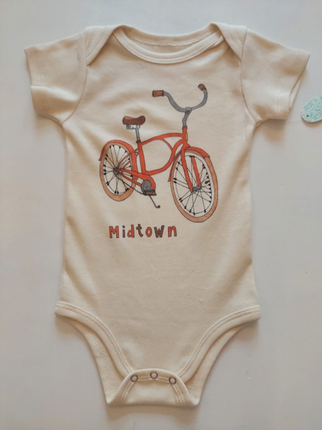 Orange Heat "midtown" bicycle onesie - Natural organic