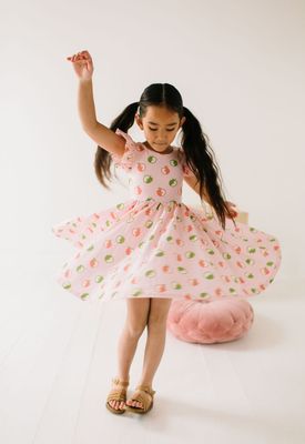 Ollie Jay Olivia twirl  dress in Apple a Day print