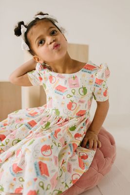 Ollie Jay Puff  twirl  dress in School Vibes print