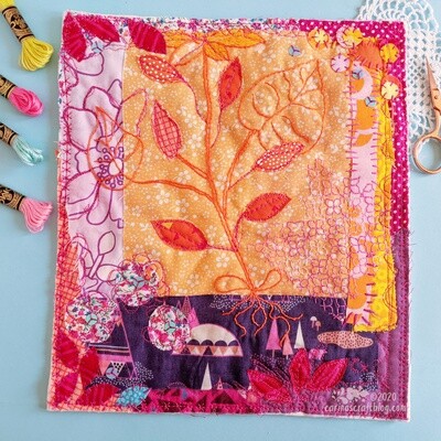 Orange and purples wall hanging