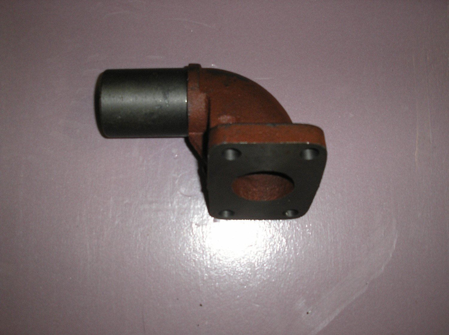 Exhaust elbow