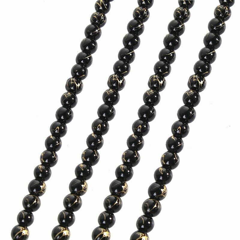 30 perles de verre  6 mm noir et or