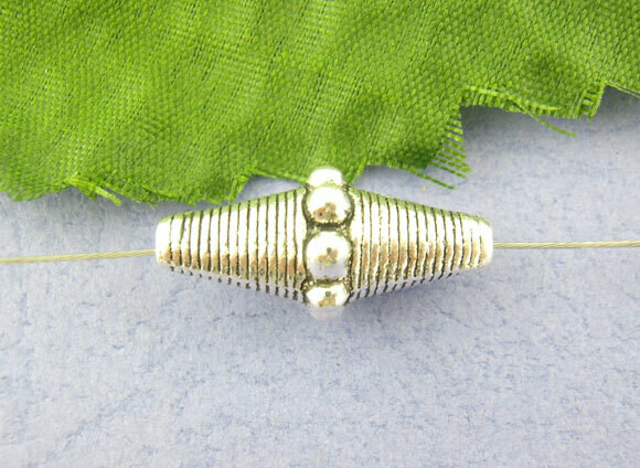 4 perles bicones en argent tibétain 8 x 21 mm