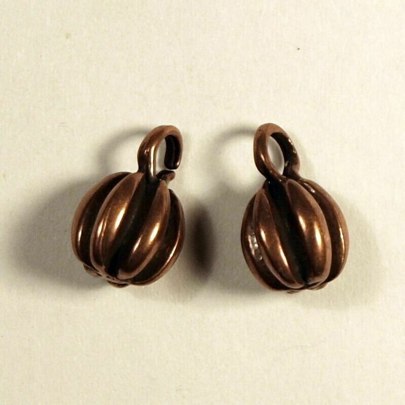 2 perles "citrouille" métal couleur cuivre 13x8 mm