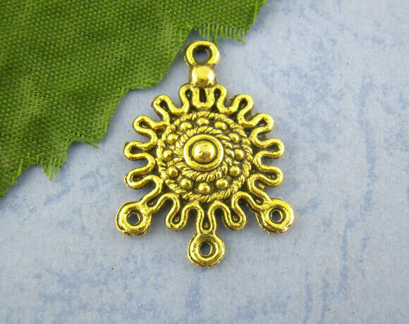 4 multirangs soleil en métal doré antique diamètre 18 x 27 mm