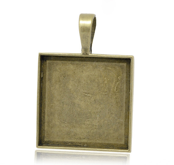 Pendentif support de cabochon ou camée couleur bronze 38 x 27 mm