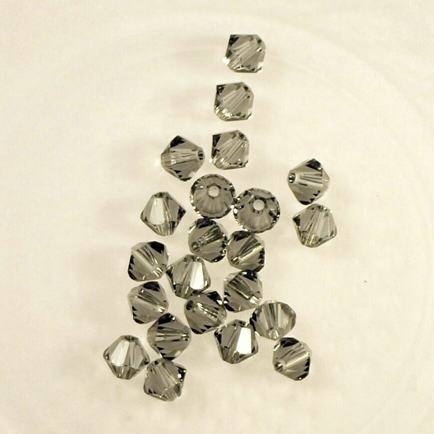 50 perles  toupies en cristal de Swarovski  5328 Black Diamond 4 mm