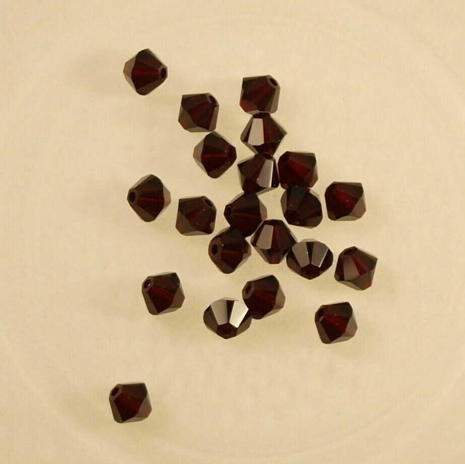 50 perles  toupies en cristal de Swarovski  5328 garnet 4 mm