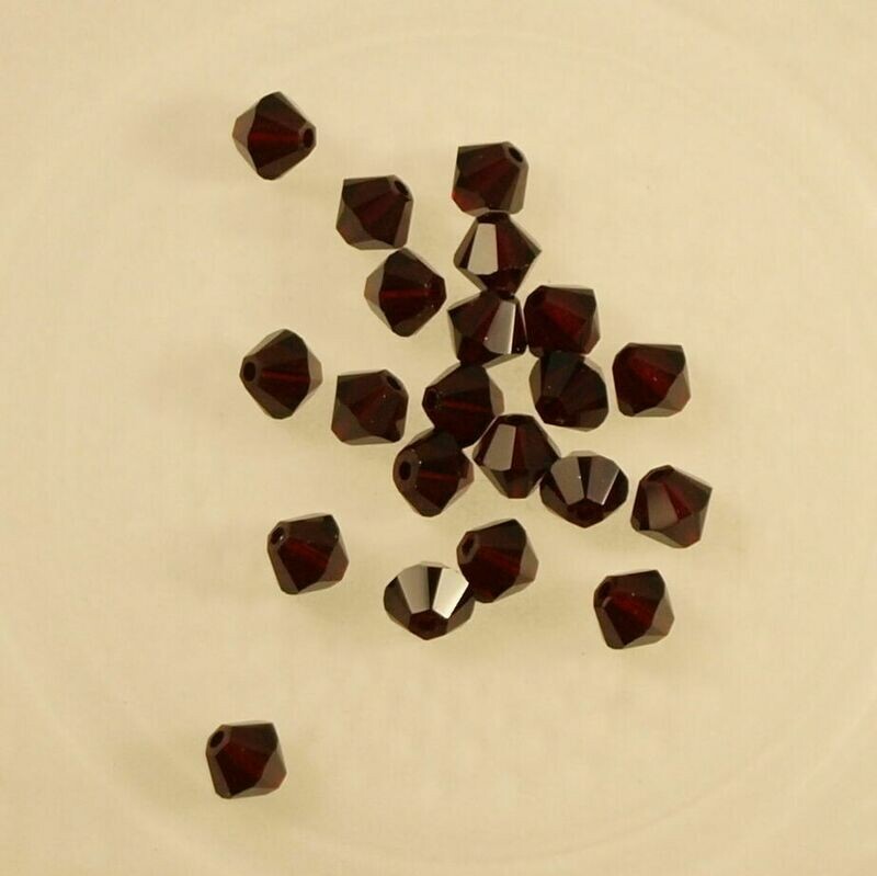 50 perles  toupies en cristal de Swarovski  5328 garnet 4 mm