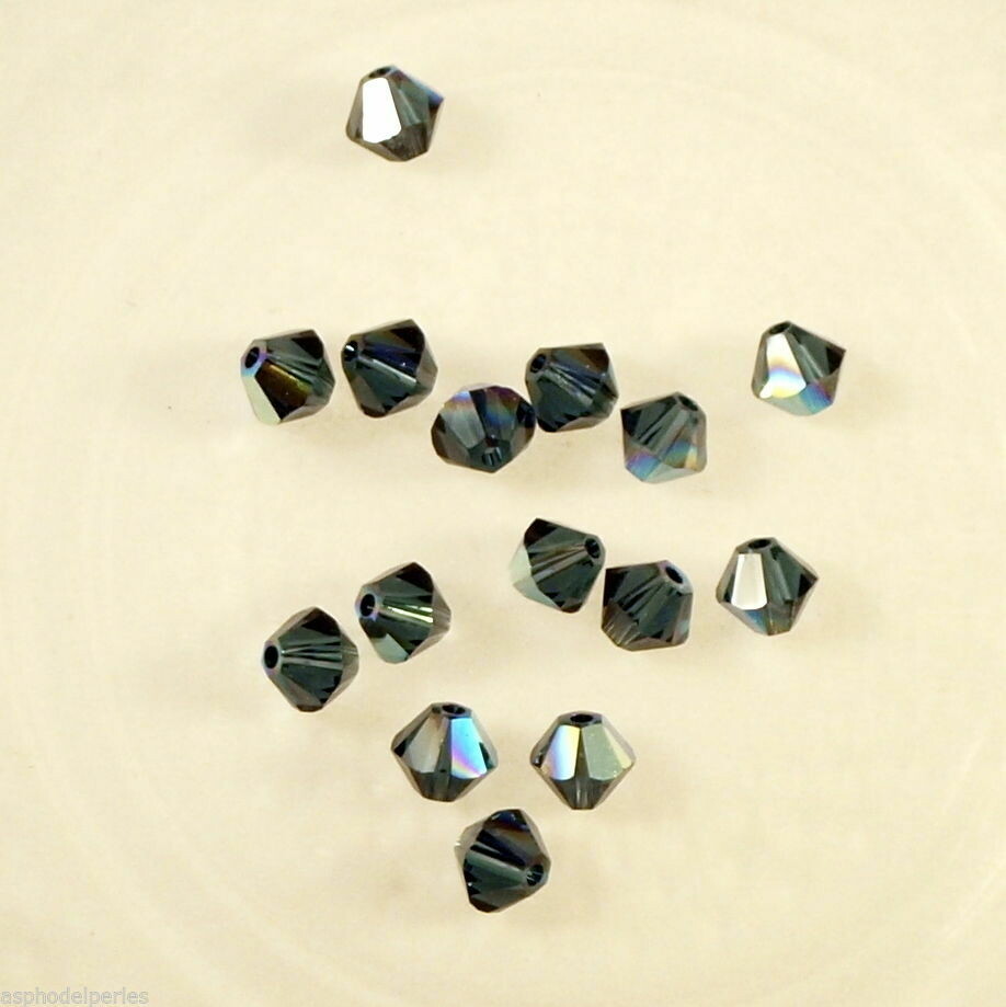 50 perles  toupies en cristal de Swarovski  5328 Montana AB 4 mm