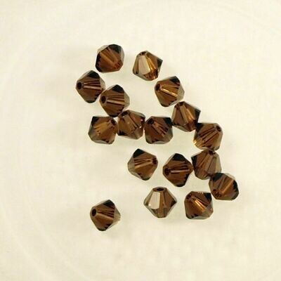 50 perles toupies en cristal de Swarovski 5328 Smoked topaze 4 mm