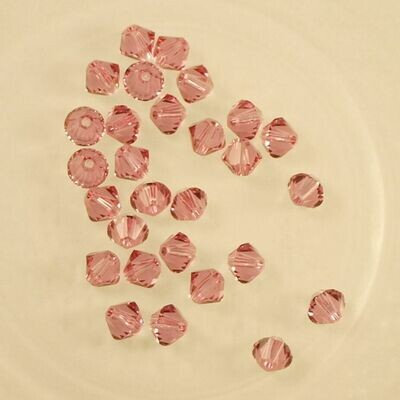 50 perles toupies en cristal de Swarovski 5328 Rose 4mm