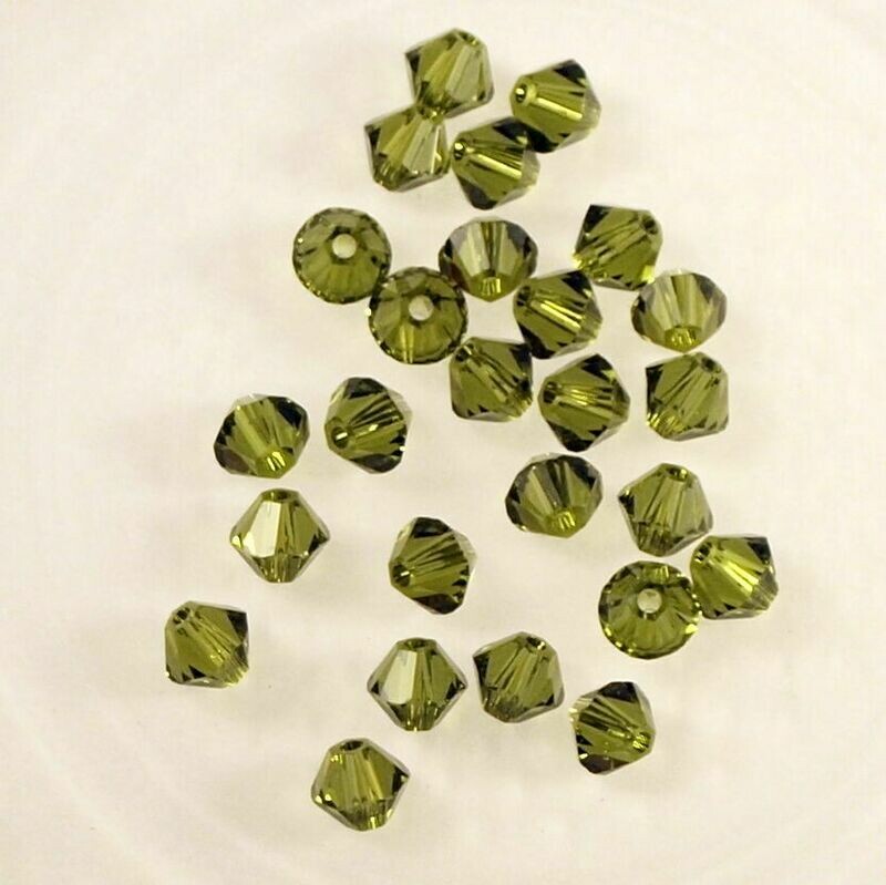 50 perles  toupies en cristal de Swarovski  5328 Olivine 4 mm