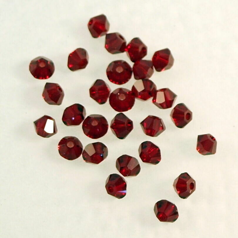 50 perles  toupies en cristal de Swarovski  5328 Siam 3 mm