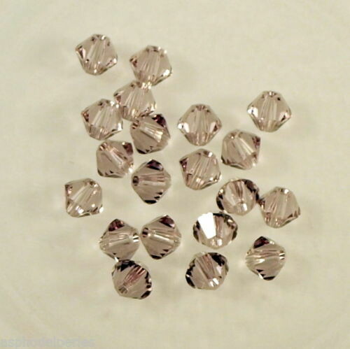 50 perles  toupies en cristal de Swarovski  5328 Light Amethyst 3 mm