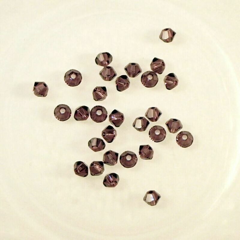 50 perles  toupies en cristal de Swarovski  5328 Amethyst 3 mm