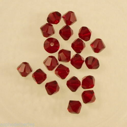 50 perles  toupies en cristal de Swarovski  5328 siam 4 mm