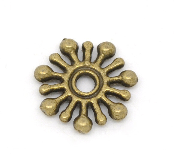 45 perles intercalaires flocon bronze 9 x 9 mm