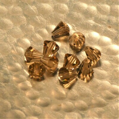10 perles cônes à facettes 5400 cristal de Swarovski 6,6 x 6 mm Light colorado topaze