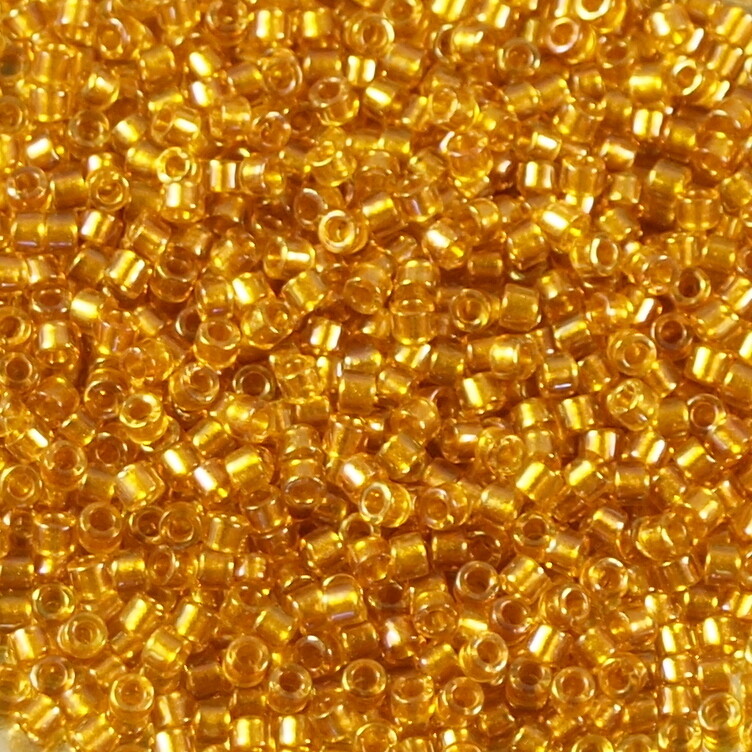 7,2 g de perles délicas ref 0065 lined topaz AB taille 11