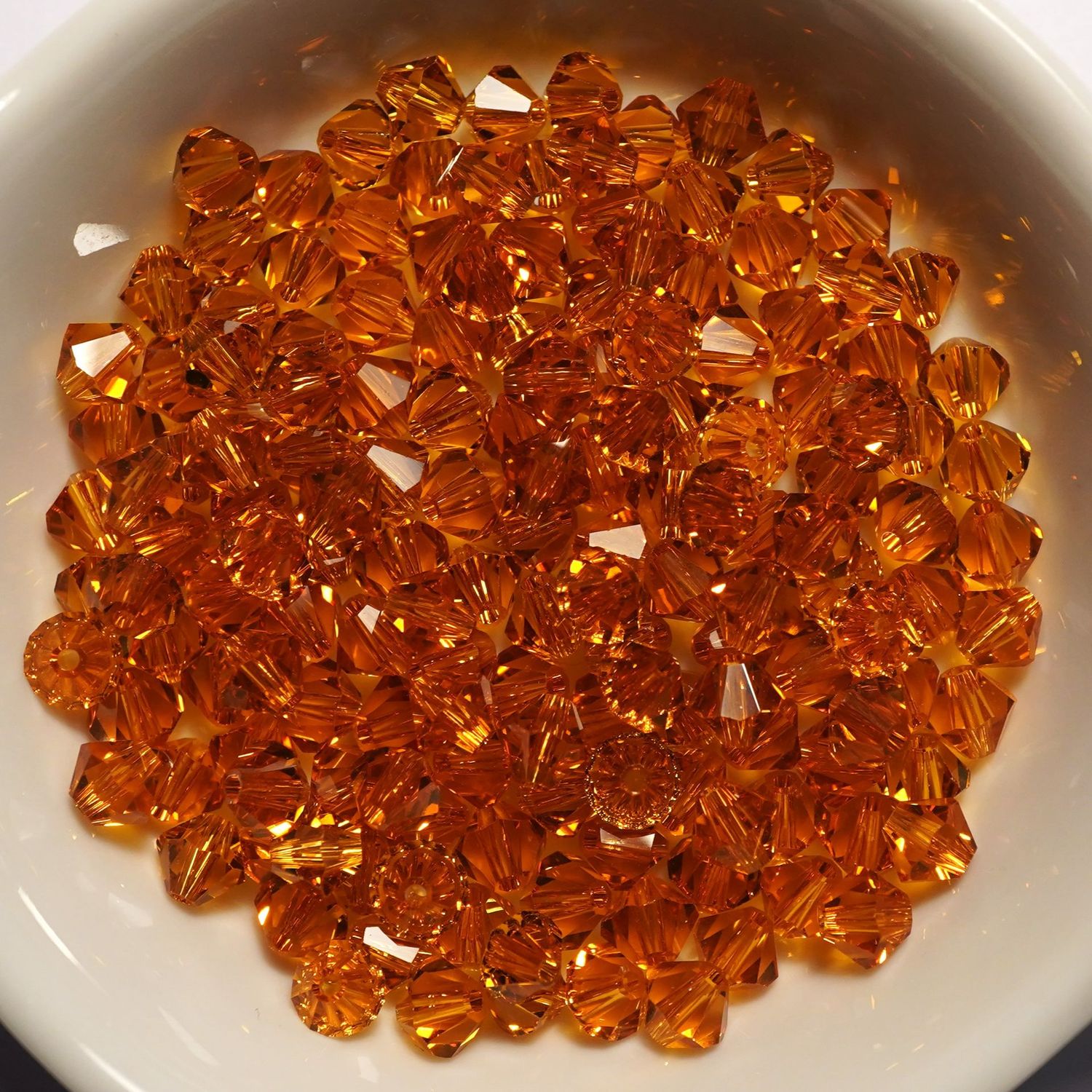 20 perles  toupies en cristal de Swarovski  5301 topaze satin 5 mm