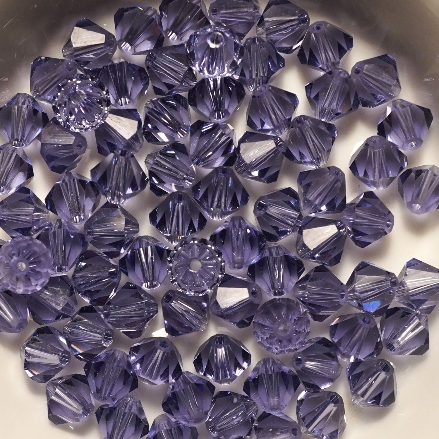 20 perles  toupies en cristal de Swarovski  5301 Tanzanite 6 mm