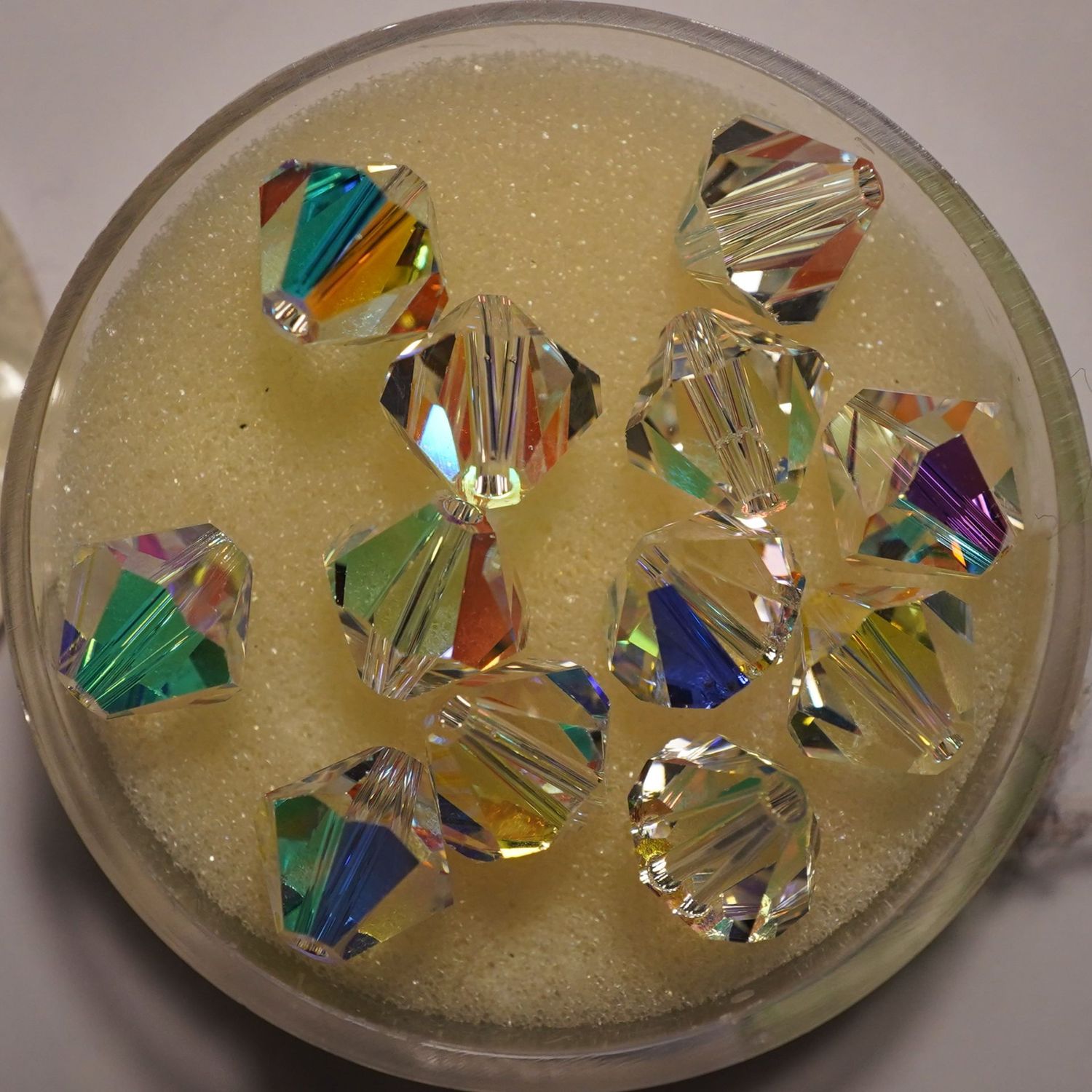 12 perles toupies 5301 cristal de Swarovski crystal AB 8 mm
