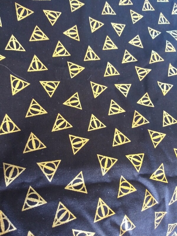 Wizarding World Harry Potter Deathly Hollow Logo in Gold Metallic  - 3/4 Yard - End of Bolt