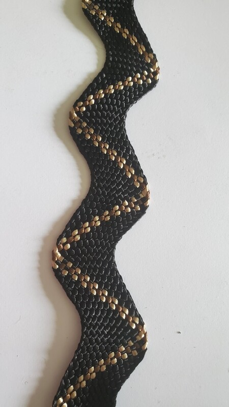 Canebrake flat trim. Blk/tan/Brn.   3/4 in.  36 yd. Reel