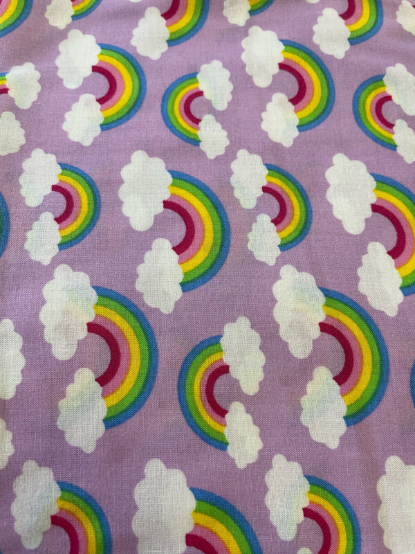 Rainbows And clouds On Purple