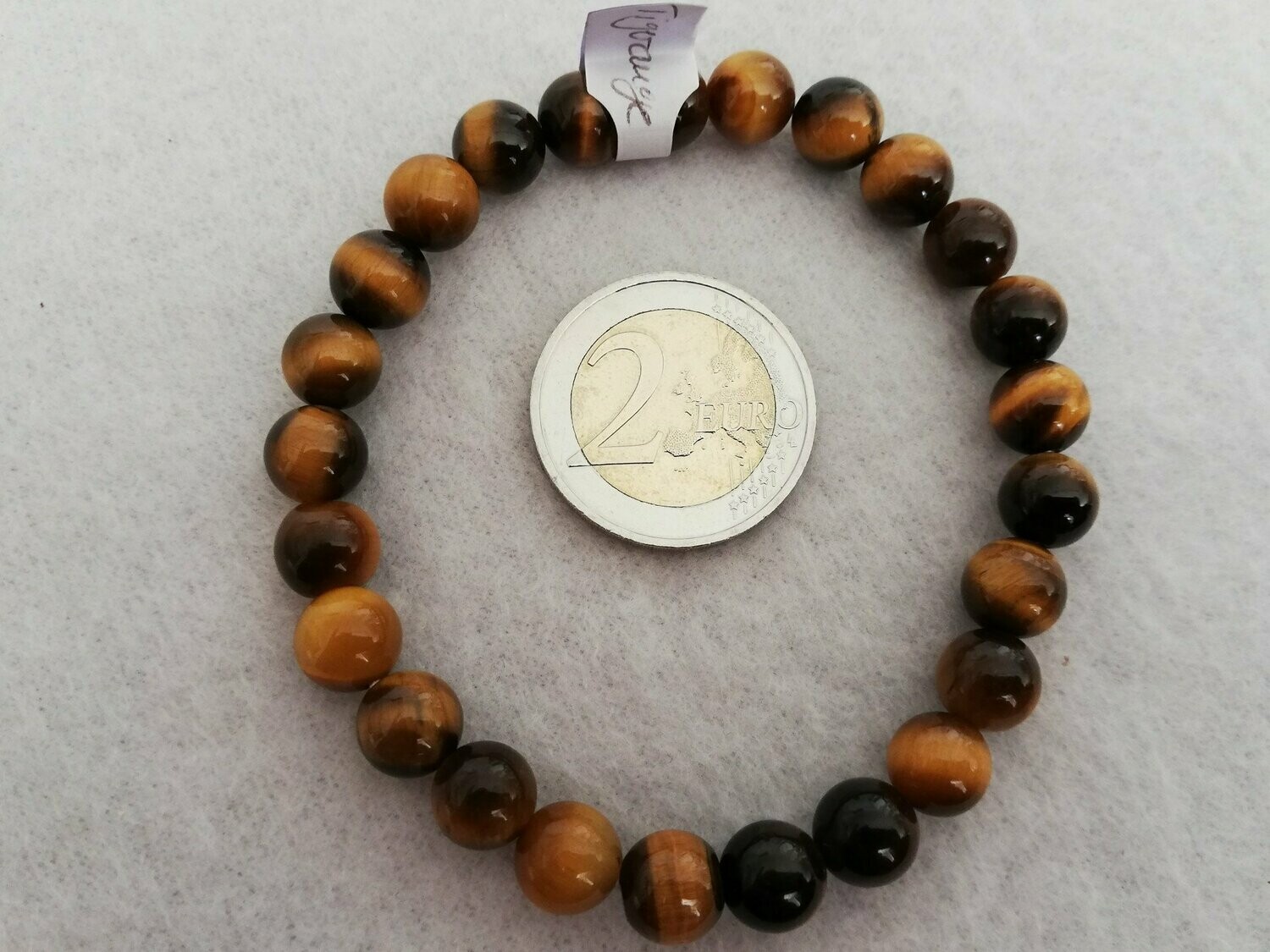 Armband aus 8mm-Tigerauge-Kugeln, etwa 6 cm Durchmesser des Armbandes