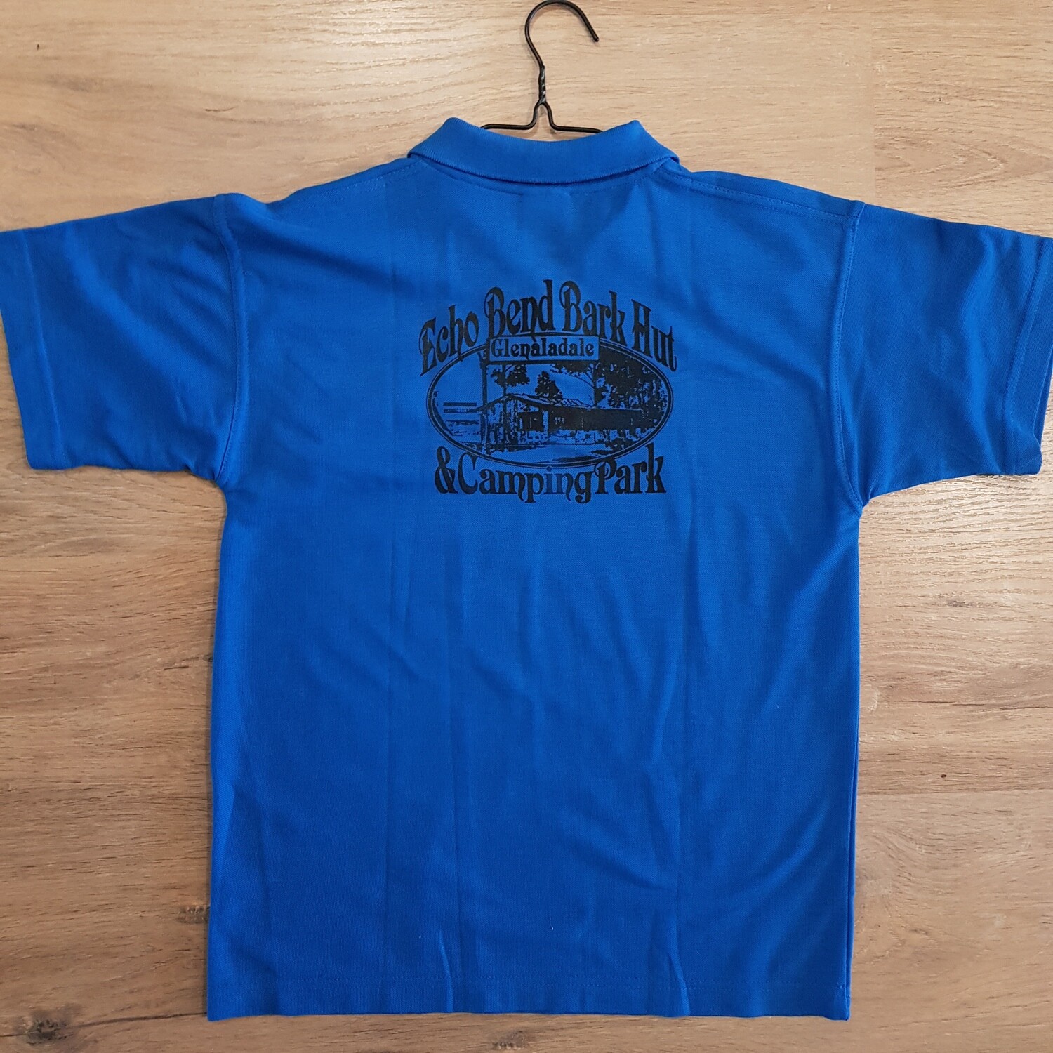 Kids Blue Polo Size 10- print on back