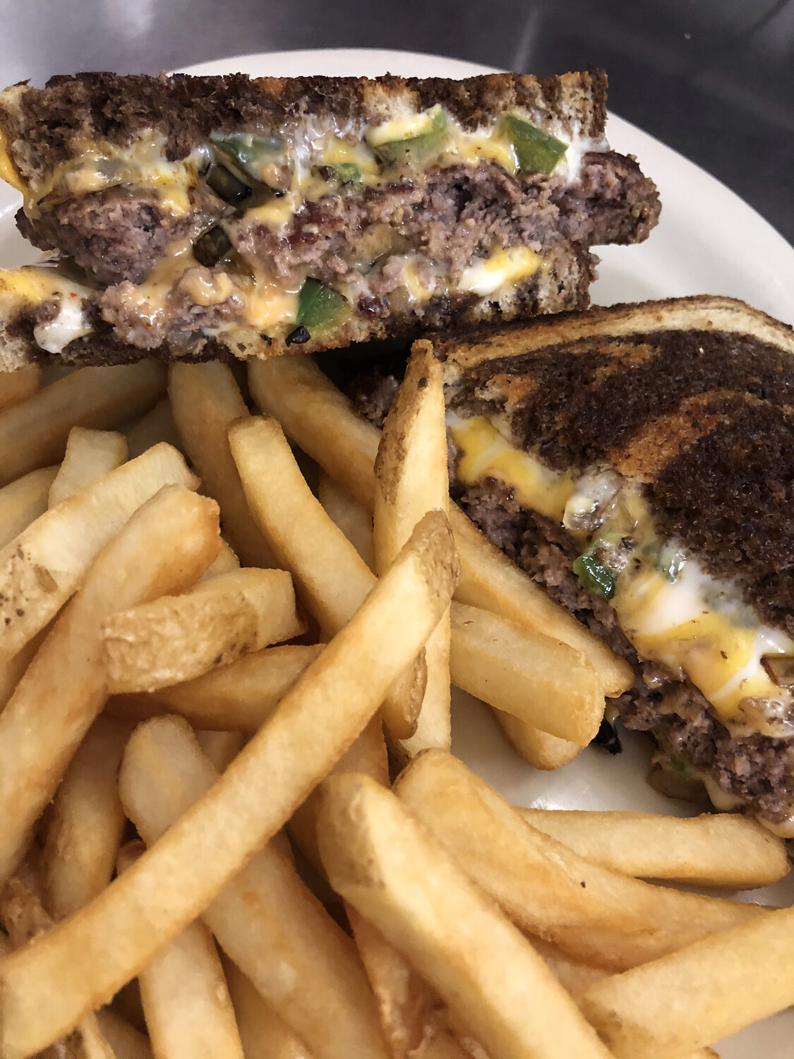 Patty Melt Burger (1/2 lb. and 2 Sides) Patty Melt Burger (1/2 lb. and 2 Sides)